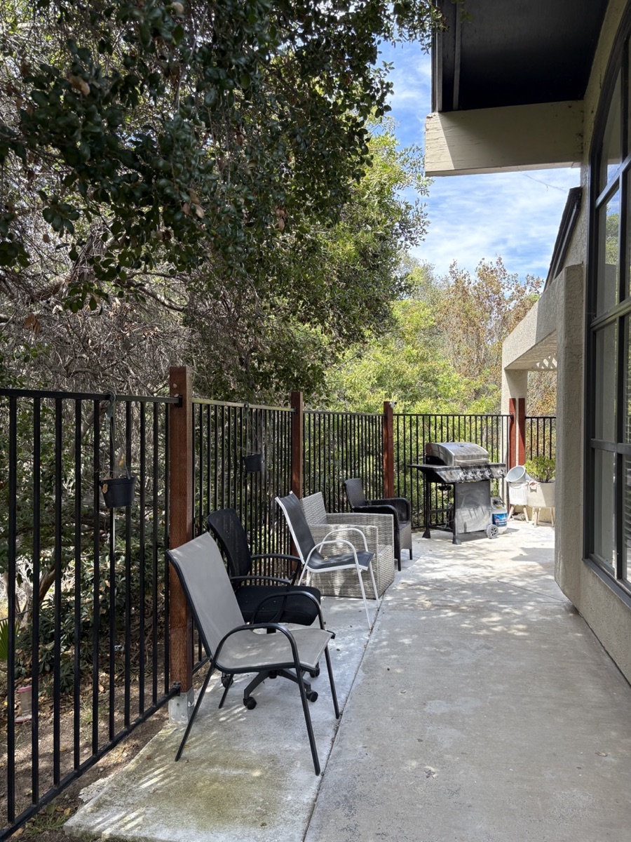 Garden paths and shaded seating at Villa Bernardo